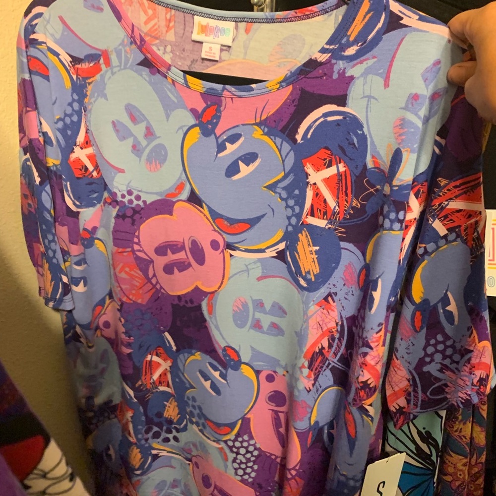 Small and large Disney lularoe shirts
